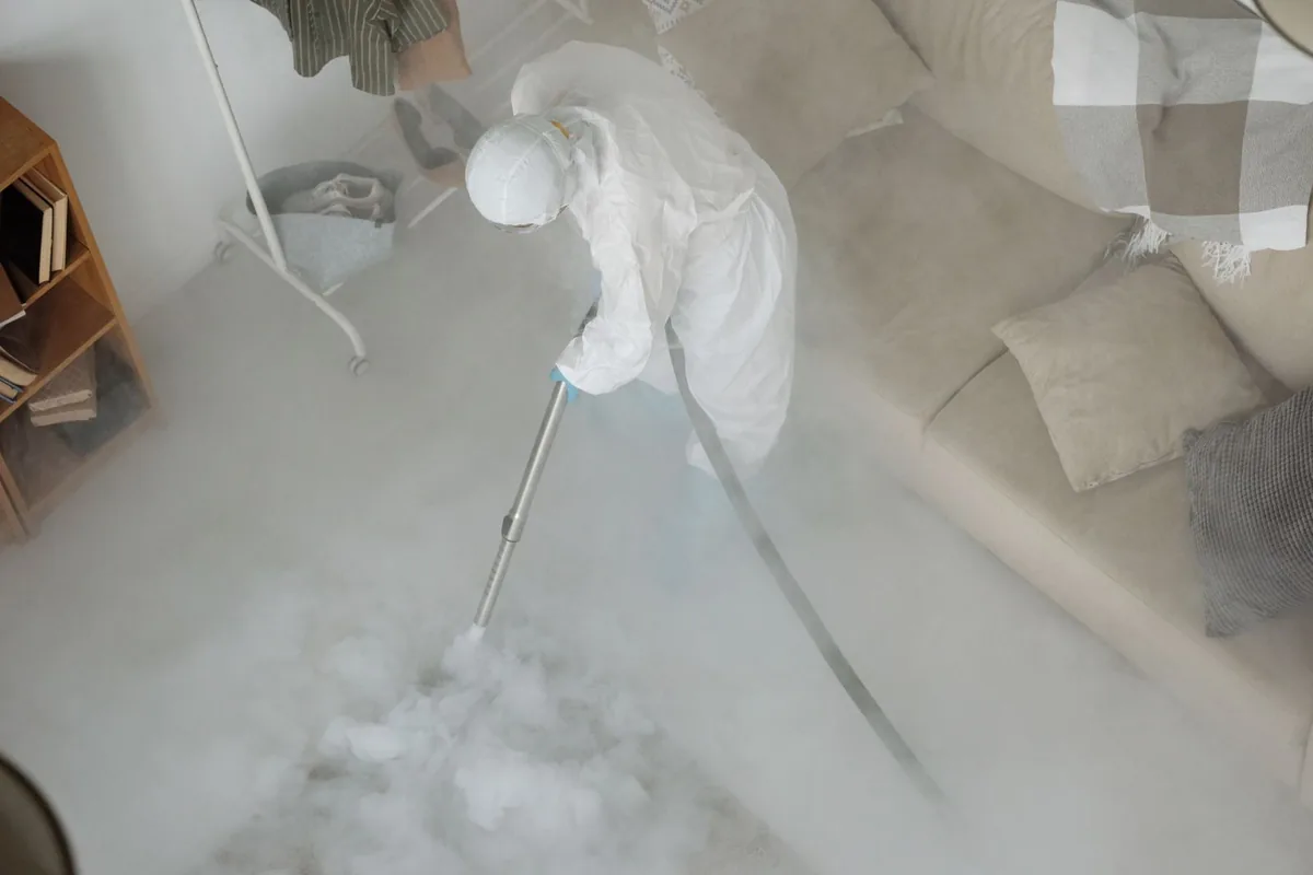 Biohazard cleanup technician in protective equipment, Clayton, CA